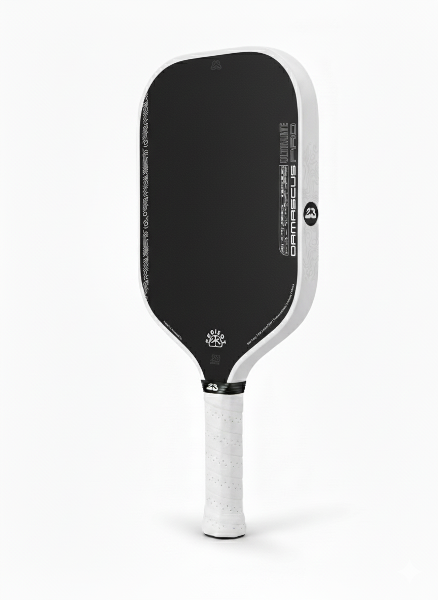 Black and white pickleball paddle on a white background